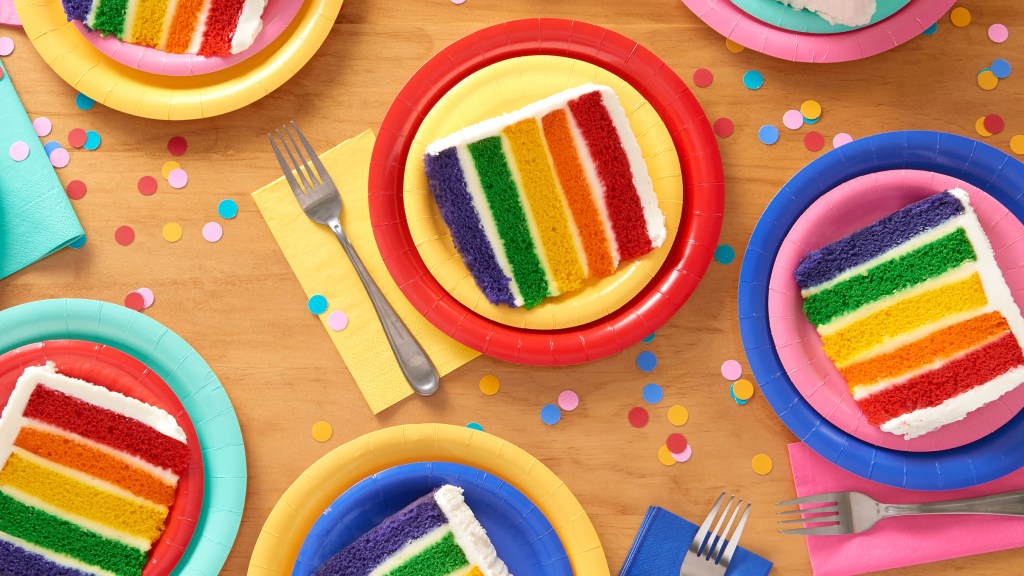 Party supplies - cake on colorful paper plates